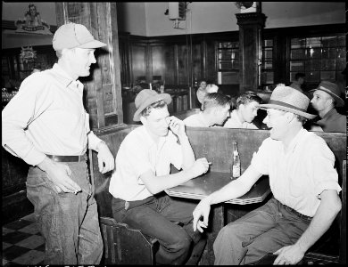 Coal miners in soda fountain. Inland Steel Company, Wheelwright ^1 & 2 Mines, Wheelwright, Floyd County, Kentucky. - NARA - 541456 photo