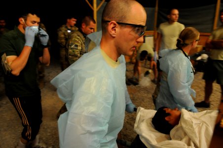 Coalition Troops Provide Medical Care to Wounded ANA Soldiers 130506-N-LR347-204