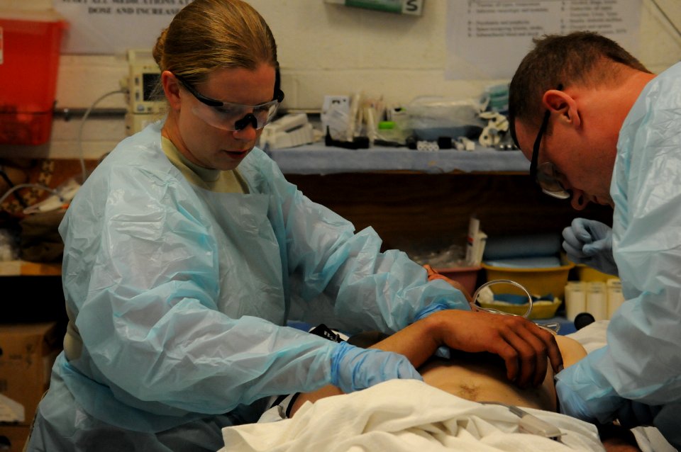 Coalition Troops Provide Medical Care to Wounded ANA Soldiers 130506-N-LR347-223