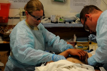 Coalition Troops Provide Medical Care to Wounded ANA Soldiers 130506-N-LR347-223