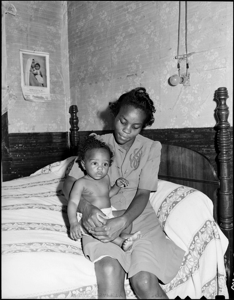 Big Sandy Housing Camp. Mines at Big Sandy closed and housing now occupied by Exeter Miners. Mrs. Beulah Wady, wife... - NARA - 540710