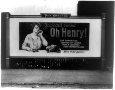 Billboard illustration showing a woman eating an Oh Henry candy bar LCCN2002711179