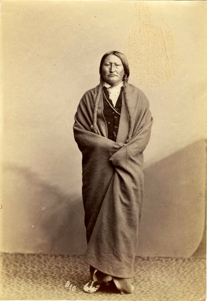 Bird chief, Arapaho (standing)