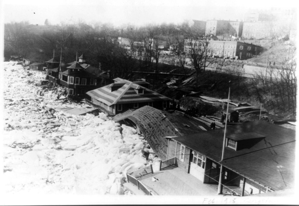 Bird's-eye view of boathouses, along the Potomac River, Georgetown, damaged by flood LCCN96507330