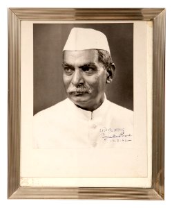 Black and white portrait photograph of Rajendra Prasad presented to President Kennedy
