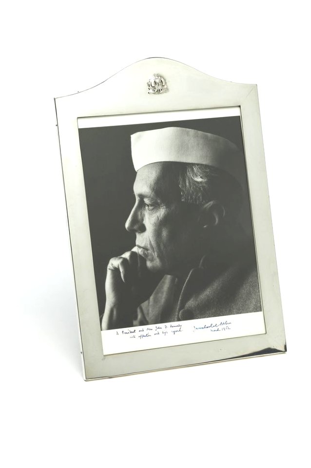 Black and white studio portrait photograph of Jawaharlal Nehru presented to the US