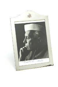 Black and white studio portrait photograph of Jawaharlal Nehru presented to the US