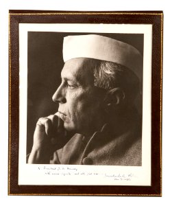 Black and white portrait photograph of Jawaharlal Nehru presented to President John F. Kennedy