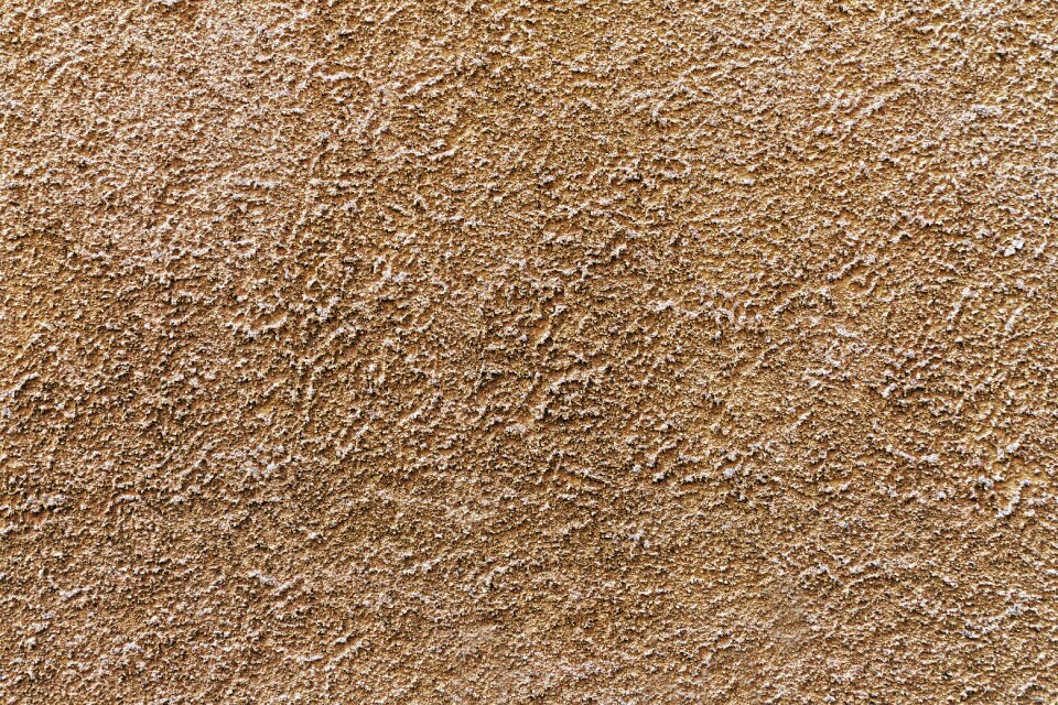 Scratch plaster textured plaster wall