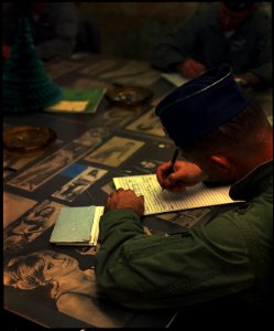 Cam Ranh Bay Air Base, South Vietnam....U.S. Air Force F-4 pilot Lieutenant Colonel Gene Levy attends an intelligence... - NARA - 542341