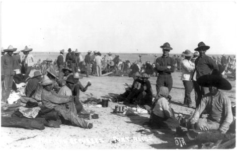 Camp for Mexican refugees, Fort Bliss, Tex- U.S. corporal standing amid refugees LCCN2016647571