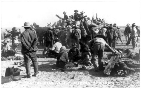 Camp for Mexican refugees, Fort Bliss, Tex- issuing wood from large wagon LCCN2016647569