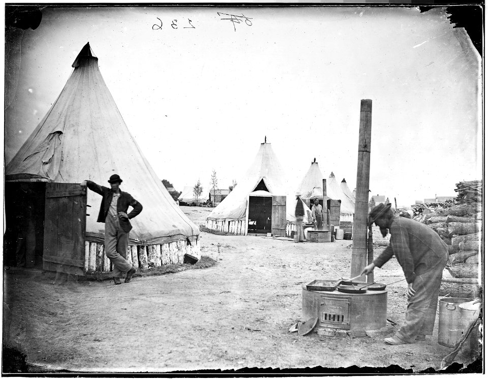 Camp Scene. Cooks at work. (4166791060)