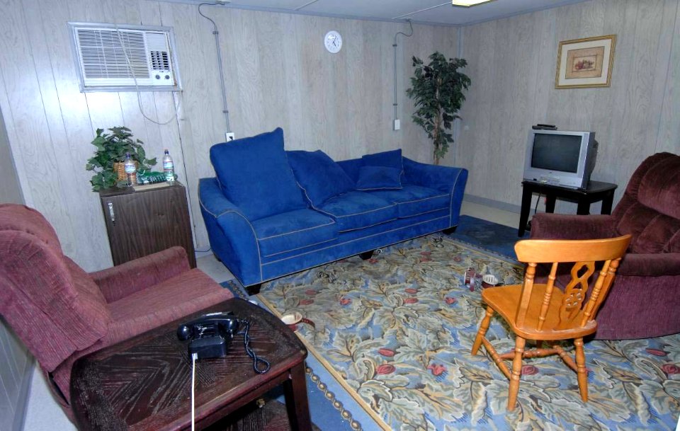 Camp one Guantanamo has a lounge for captives to phone home