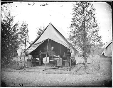 Camp scene. Officer in tent - NARA - 524636 photo