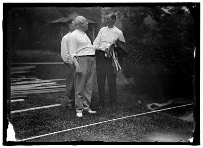 CAMP, WALTER, I.E., EXERCISE SCHOOL. CABINET OFFICIALS EXERCISING WITH OTHER GOVT. OFFICIALS LCCN2016868103