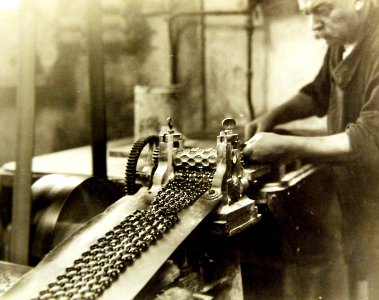 Candy cutting machine at E. Josse Candy Factory Paris, France 1919 (31337607323) photo