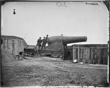 Cannon of largest size mounted in Fort, at Battery Rodgers - NARA - 524772 photo