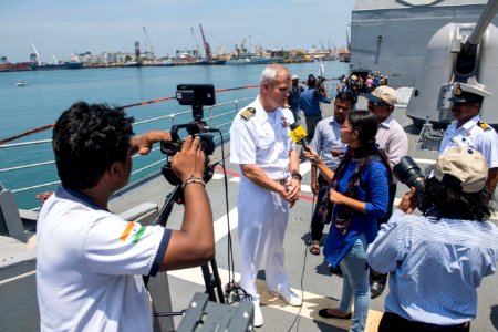 Capt. Christopher Alexander, commanding officer of the Ticonderoga-class guided-missile cruiser USS Princeton (CG 59), is interviewed by Indian media during Malabar 2017 photo