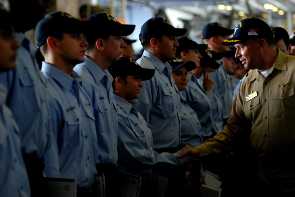 Capt. K.J. Norton congratulates sailors DVIDS620607