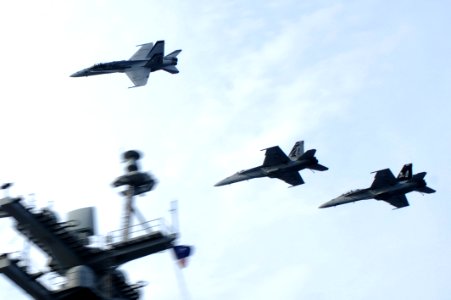 Capt. Paparo breaks formation above USS Dwight D. Eisenhower. (8247726918)