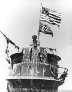 Captain Daniel V. Gallery, USN, on the bridge of the captured German submarine U-505 on 4 June 1944 (80-G-49176)