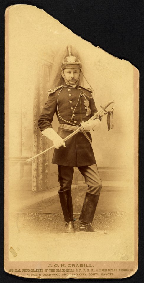 Captain Thomas C. Lebo, 10th Cavalry, wearing officers dress uniform) - J. C. H. Grabill, official photographer of the Black Hills & F. P. R. R., & Home Stake Mining Co., Studios, Deadwood LCCN2010645140