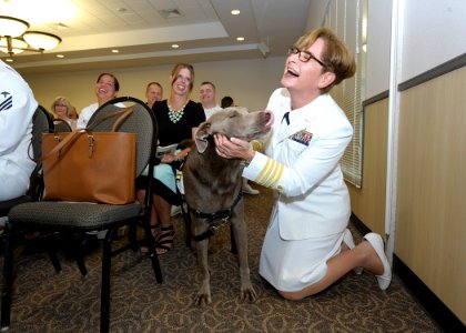 Captain Marnie S. Buchanan with a dog