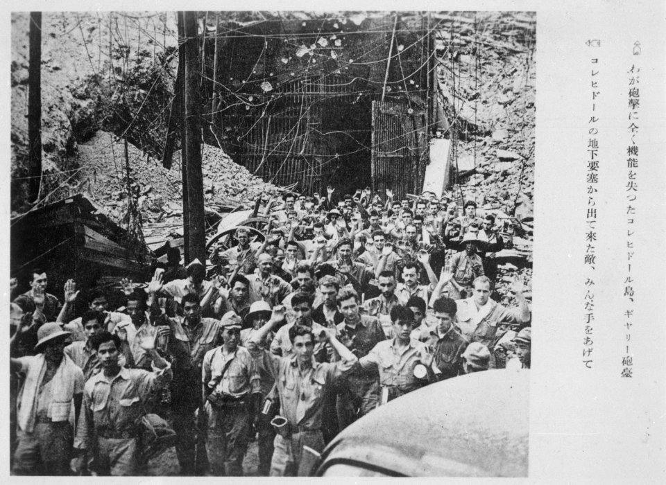 Captured Japanese photograph. U.S. soldiers and sailors surrendering to Japanese forces at Corregidor, Philippine... - NARA - 531354