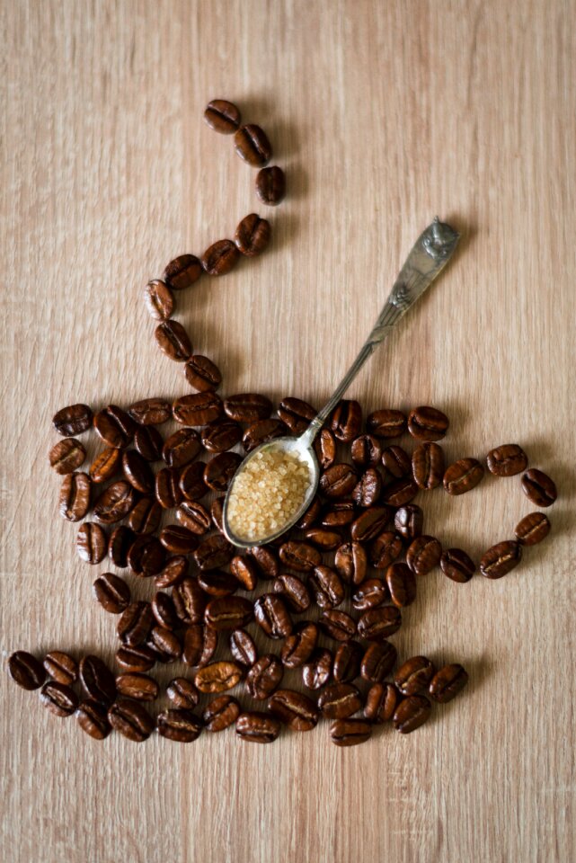 Coffee beans coffee cup spoon
