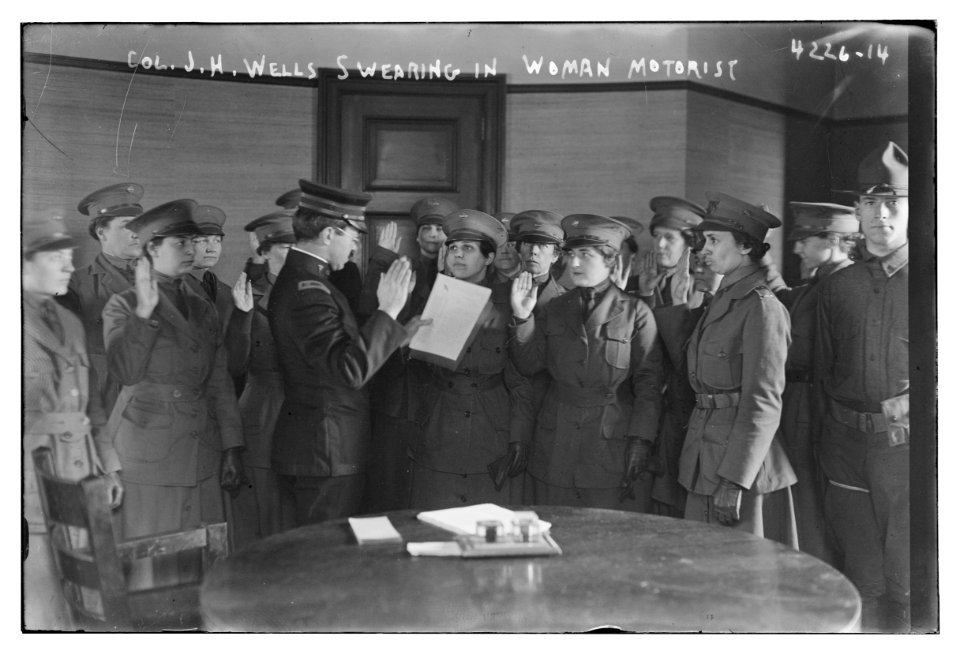 Col. J.H. Wells swearing in woman motorist LCCN2014704700