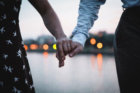 Couple holding hands engagement photo