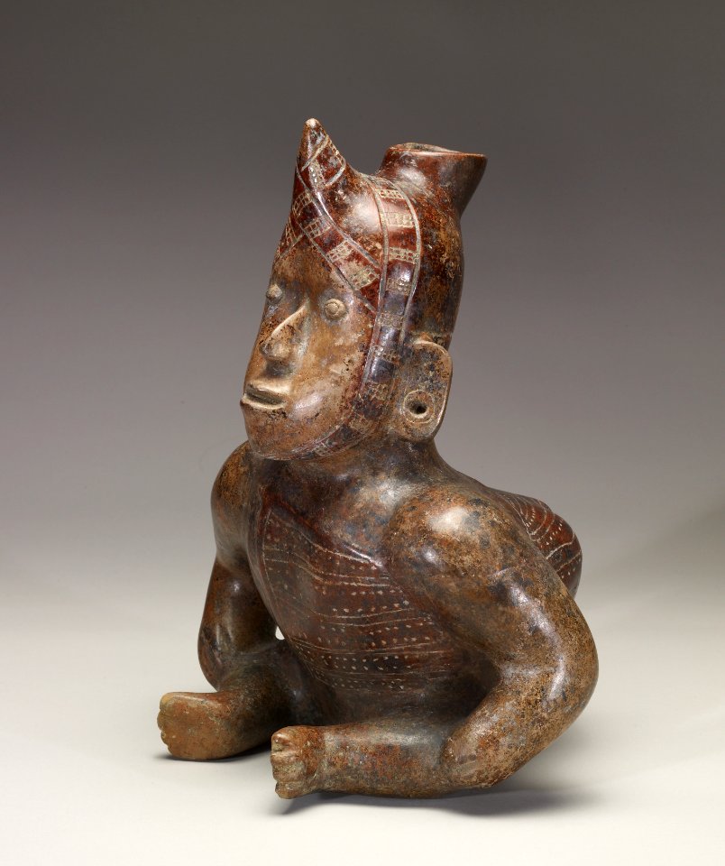 Colima - Seated Dwarf Shaman with Horn on Forehead and Hands on the Knees - Walters 482792 - Three Quarter