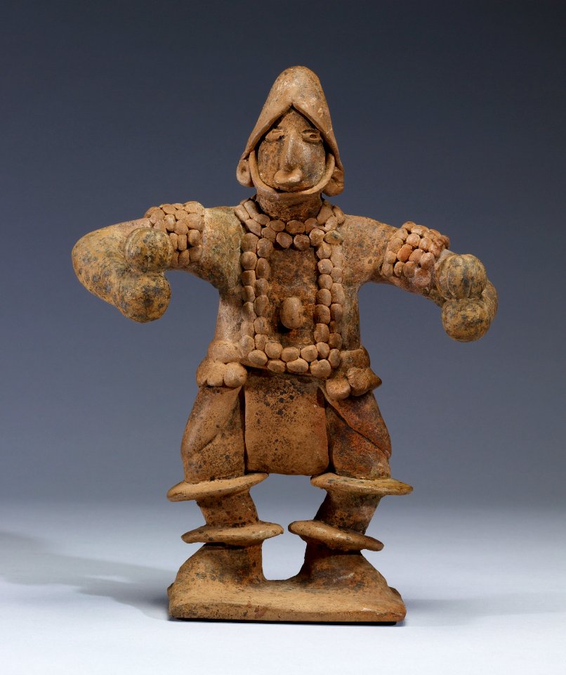 Colima - Standing Figure with Elaborate Costume Holding Rattles - Walters 482808