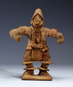 Colima - Standing Figure with Elaborate Costume Holding Rattles - Walters 482808