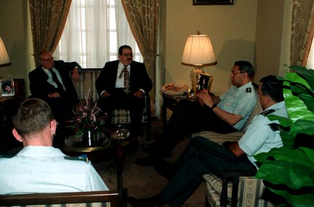 Colin Powell and J. A. Joulan, meet with Deane R. Hinton and Guillermo Endara