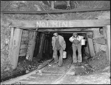 Blaine Sergent, left, comes out of the mine at the end of the day's work. P V & K Coal Company, Clover Gap Mine... - NARA - 541293