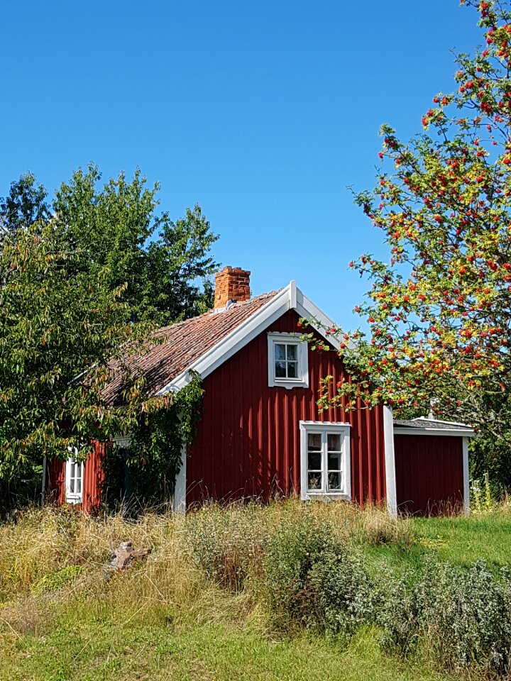 Red house with white trim september sweden