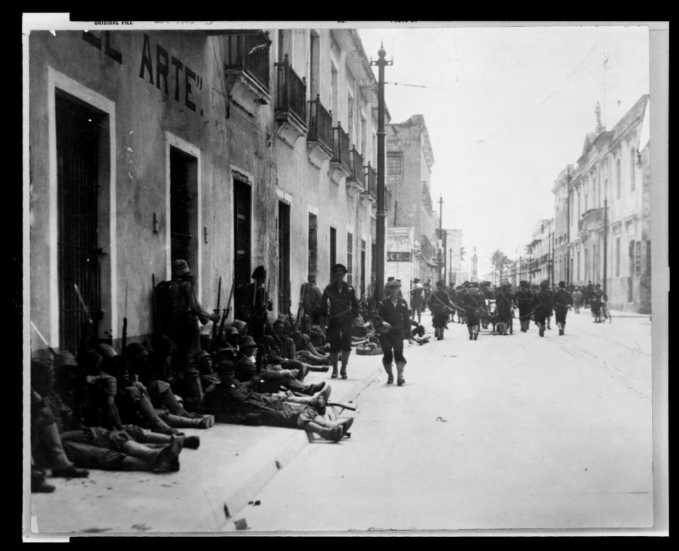 Blue jackets resting on sidewalk - Mexican War LCCN2010651722