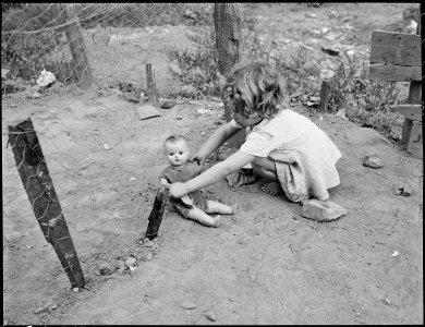 Bobbie Jean Sergent playing in her front yard. P V & K Coal Company, Clover Gap Mine, Lejunior, Harlan County, Kentucky. - NARA - 541358