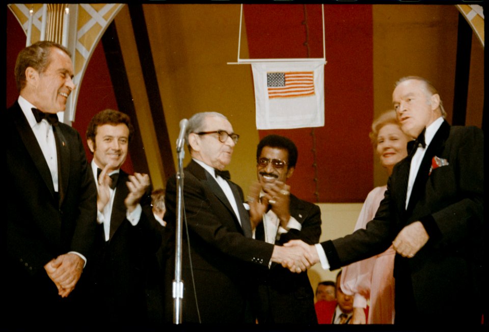 Bob Hope and Irving Berlin Shakes Hands on Stage at a White House Dinner Held in Honor of Returning Vietnam Prisoners of War
