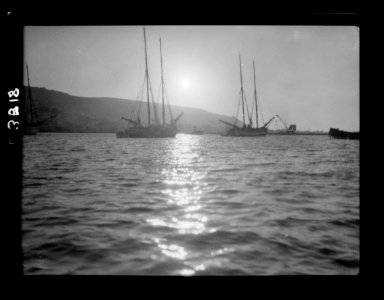 Carmel and Haifa. Carmel at sunset. Tall-masted sailing vessels at anchor LOC matpc.15381