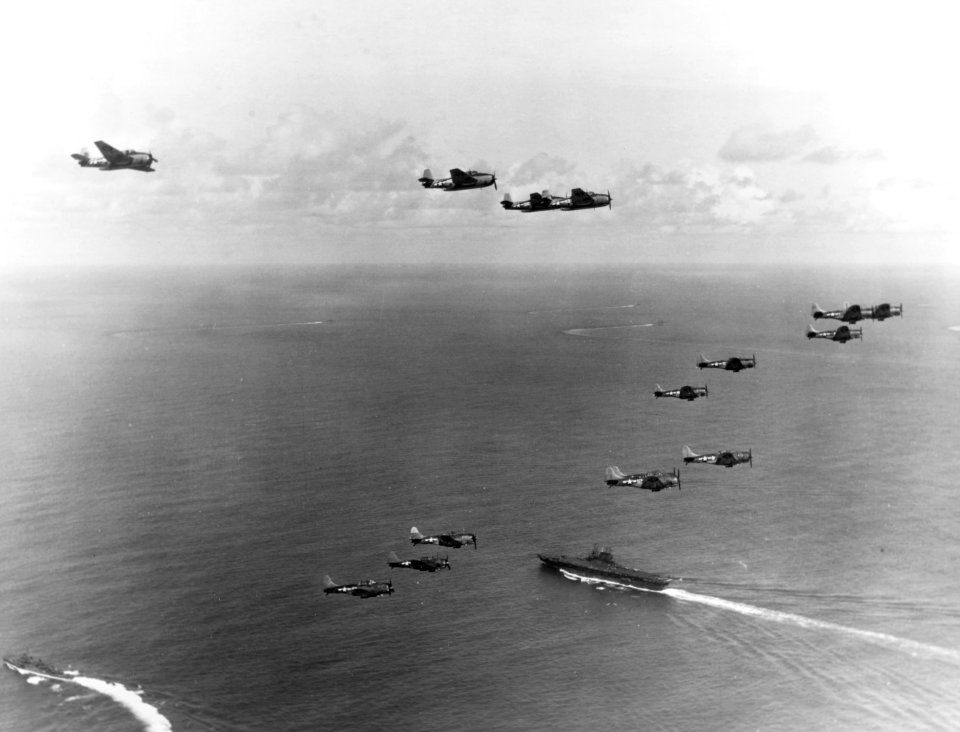 Carrier Air Group 10 aircraft over USS Enterprise (CV-6) off Palau in March 1944
