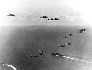 Carrier Air Group 10 aircraft over USS Enterprise (CV-6) off Palau in March 1944