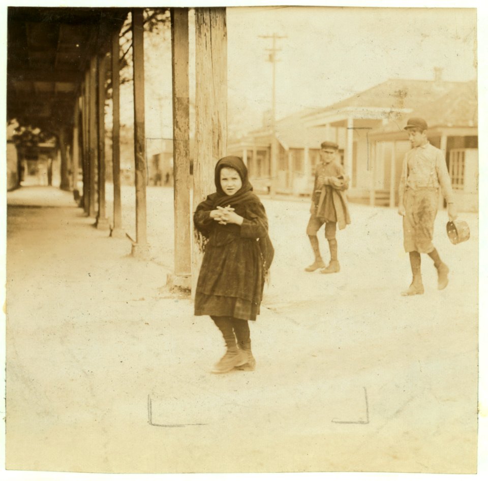Carrie, a seven year old oyster shucker at Pass Packing Co., going home at 5-00 P.M. after a day beginning at 4-00 A.M., and spent shucking oysters and tending the baby. A common practice LOC nclc.00873