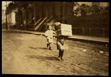 Carrying tags. A little tot with a heavy load. LOC nclc.04236 photo