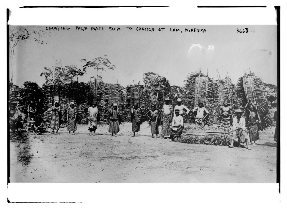 Carrying palm mats 50 m. to church at Lam, W. Africa LCCN2014700268