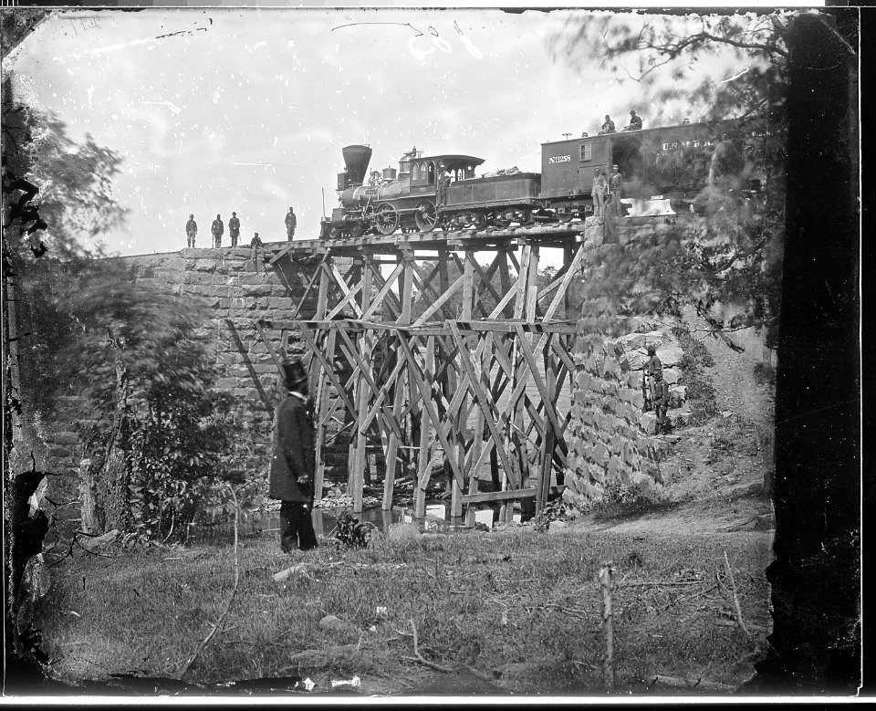 Cars of U.S. Military R. R., and bridge built by Soldiers. Orange and Alexandria R. R. - NARA - 524604