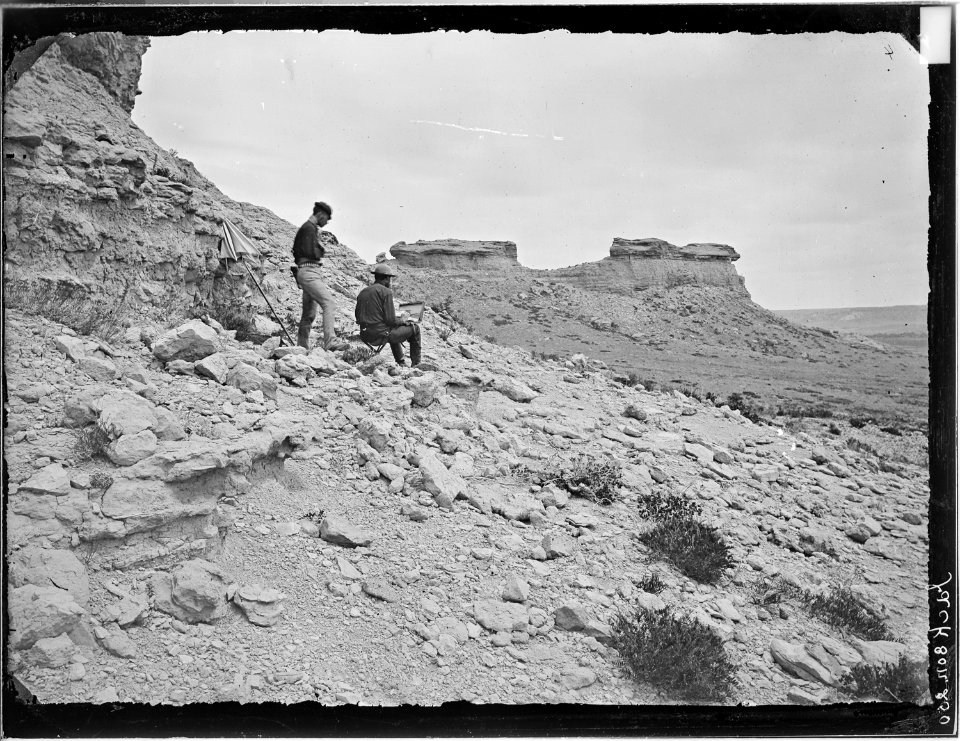 Castellated rocks on the Chugwater. S.R. Gifford, artist, on right. - NARA - 516859