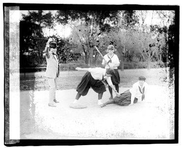 Catcher Lucile Boyd at bat Francis Bloomer sliding Gertrude Cherry LCCN2016827122